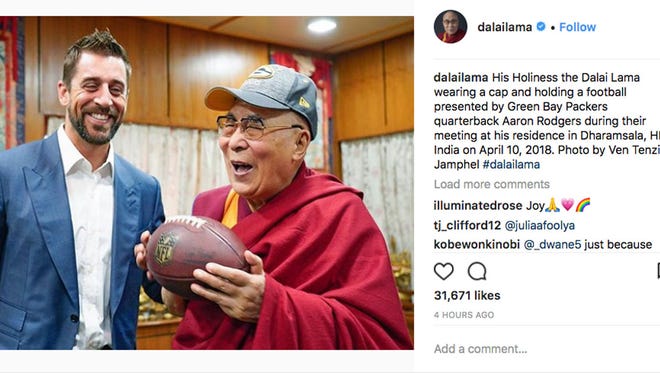 Dalai Lama Gets Green Bay Packers Swag From Aaron Rodgers