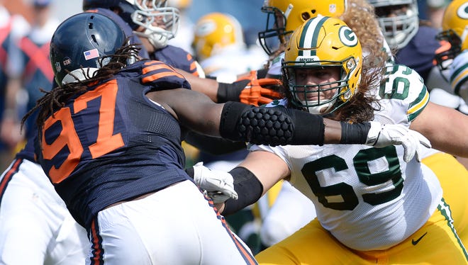 Green Bay Packers tackle David Bakhtiari (69) pass protects against Chicago Bears defensive end Willie Young (97) during the game at Soldier Field in Chicago on Sept. 28, 2014.