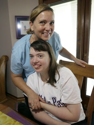 Sally Gaer talks with her daughter Margaret, 25, in their West Des Moines home in 2015. Gaer is pleased that more Iowans are supporting medical marijuana, according to the latest Iowa Poll.