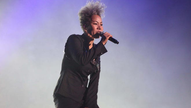 Insooni performs at the 2011 Cyworld Festival. The Korean singer has an Olympics theme song this year in 'Let Everyone Shine.'