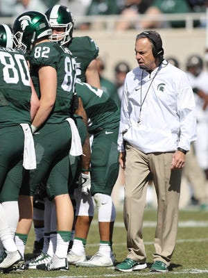 Michigan State head coach Mark Dantonio watches the action during the spring game at Spartan Stadium, Saturday, April 1, 2017.