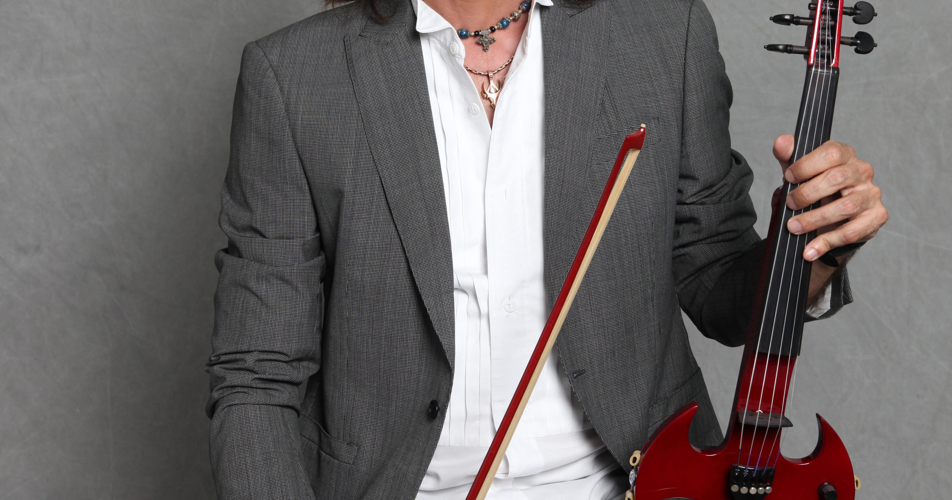 Electric violinist Mark Wood turns orchestra kids into rock stars