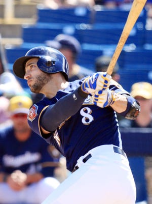 Ryan Braun watches the first of his two home runs leave the park Wednesday against the White Sox.