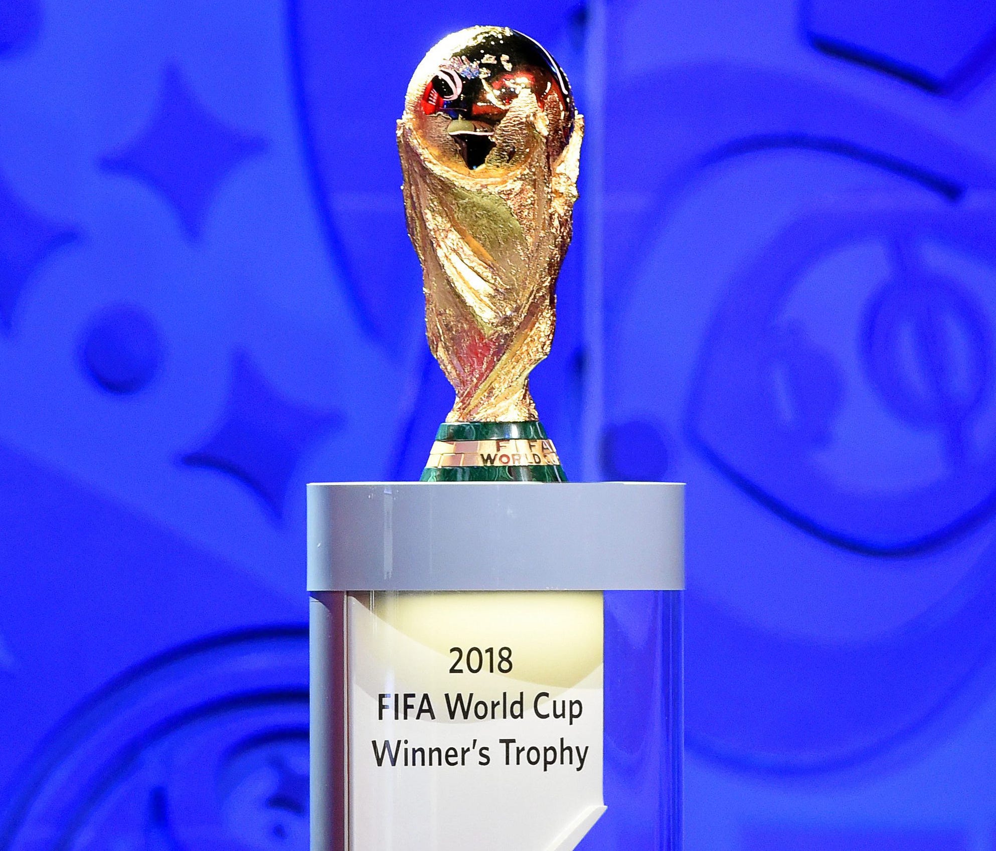 The FIFA World Cup Trophy on display during the Preliminary Draw of the FIFA World Cup 2018 at Konstantinovsky palace outside St.Petersburg, Russia,.