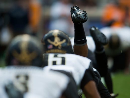 A Vanderbilt player's foot raises in the air while