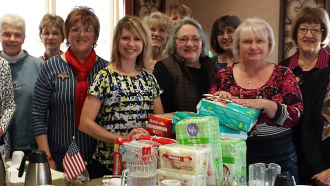Republican women of three counties held a morning brunch recently to discuss women's issues and highlight The Hannah Center, a local women's outreach in Marshfield. Guest speaker was Aimee Tippen from The Hannah Center. Pictured are Shirley Starck, from left, Joannie Brumbaugh, Patsy Schneider, Jeanie Moore, Aimee Tippen, Judy Van Ert, Jenny Jakyl, Bev Pettis, Donna Rozar, Karen Mueller, Sherry Nussbaum and Floreine Kurtzweil.