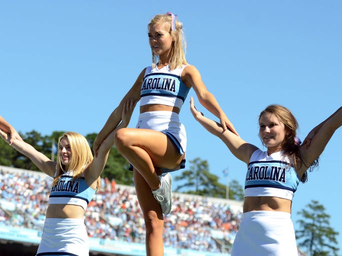 Spirited NCAA football cheerleaders around the country Spirited NCAA football cheerleaders around the country