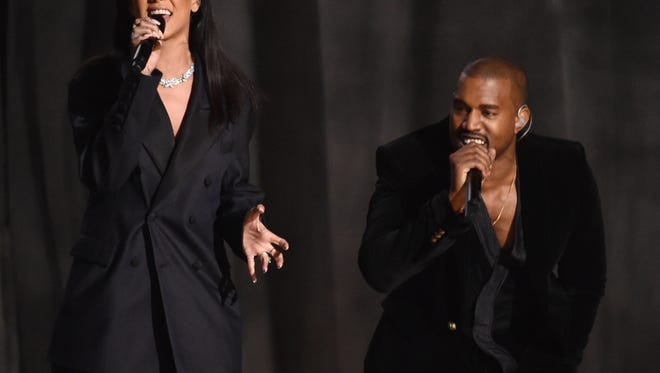 Rihanna, left, and Kanye West perform at the 57th annual Grammy Awards on Sunday, Feb. 8, 2015, in Los Angeles.