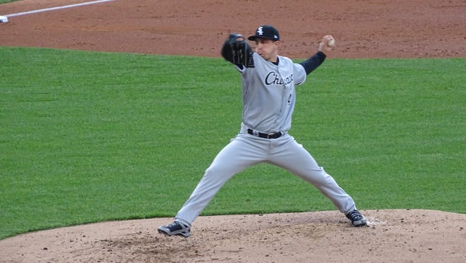 Chicago White Sox left-hander Derek Holland, a Newark graduate, pitches during the second inning Wednesday against the Cleveland Indians. Holland threw six shutout innings in a 2-1 victory.