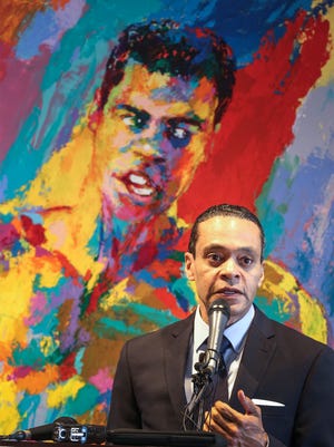 Donald Lassere, President and CEO of the Muhammad Ali Center, stands in front of LeRoy Neiman's painting of Ali entitled "Athlete of the Century".  The 55" x 80" painting has been on loan to the Ali Center.  Today, on what would have been Muhammad Ali's 75th birthday, the LeRoy Neiman Foundation announced that it would permanently donate this painting and more than a dozen more to the Muhammad Ali Center.January 17, 2017