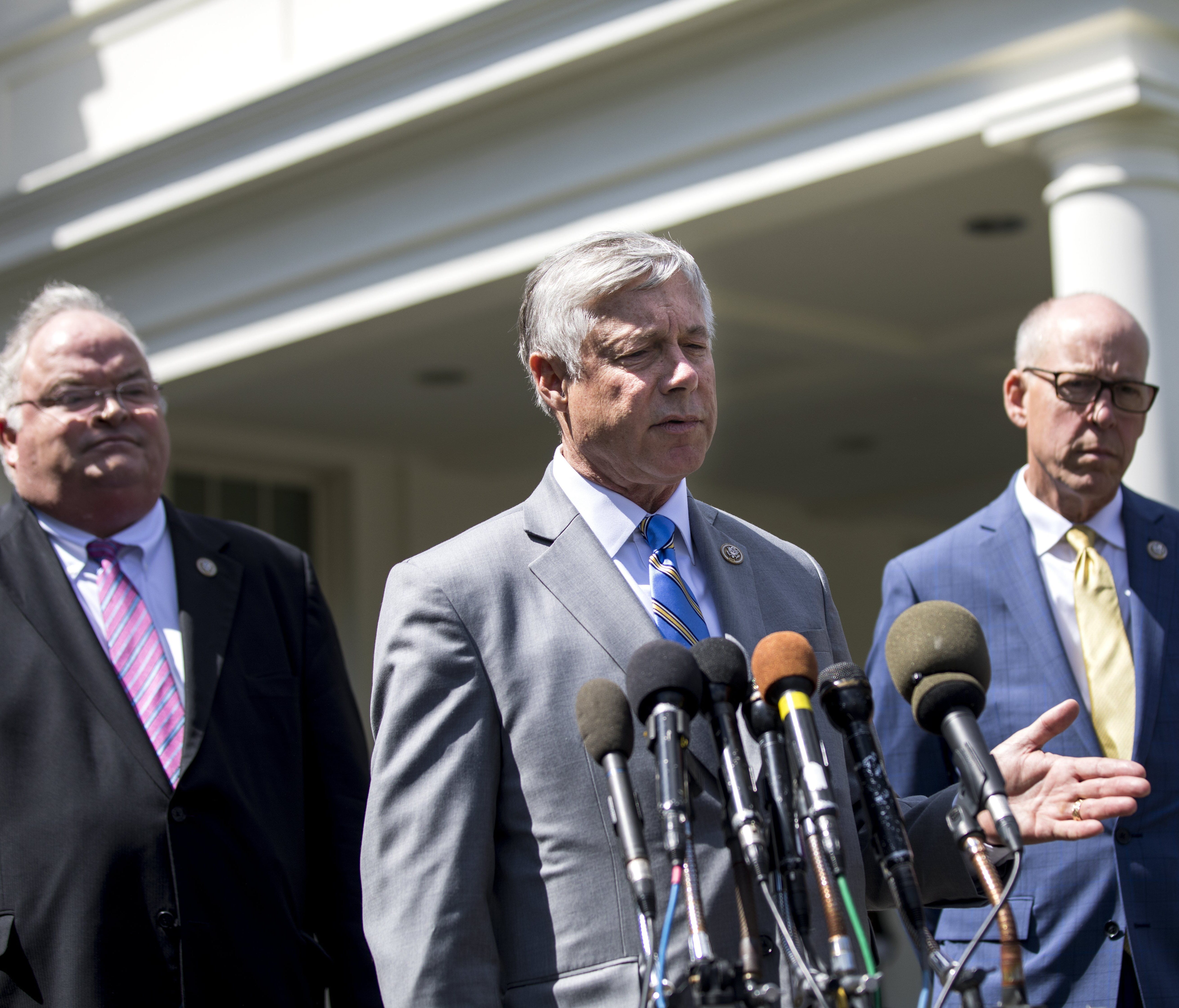 Rep. Fred Upton, joined by Reps. Billy Long and Greg Walden, speaks to the media about health care negotiations after meeting with President Trump at the White House on May 3, 2017.