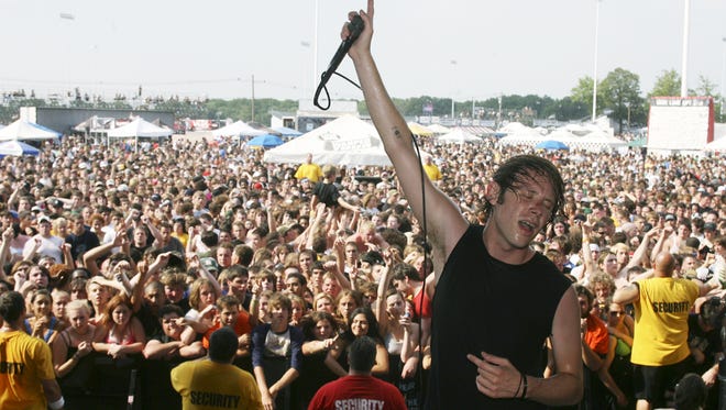 Thursday will bring their shared history with former My Chemical Romance guitarist Frank Iero to the stage of Sayreville's Starland Ballroom with a co-bill Saturday, Dec. 30. Thursday's Geoff Rickly, who produced My Chemical Romance's first two albums, is pictured in 2006 at the Vans Warped Tour at Raceway Park in Old Bridge.