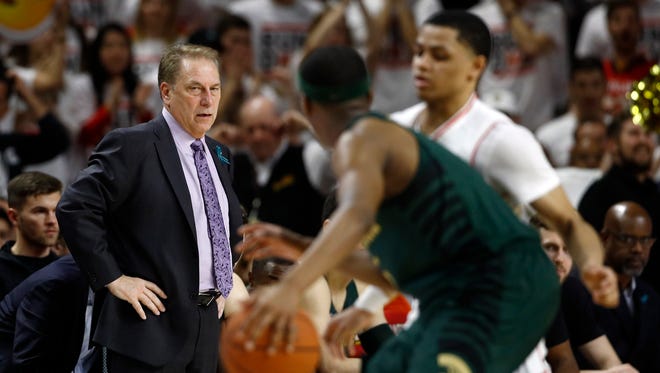 Michigan State head coach Tom Izzo watches during the second half Sunday as the Spartans take on Maryland.