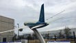 A Boeing 787 sculpture provides a fitting welcome to
