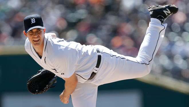 Detroit Tigers pitcher Kyle Lobstein throws against the New York Yankees in the first inning of a baseball game in Detroit Thursday, Aug. 28, 2014. (AP Photo/Paul Sancya)