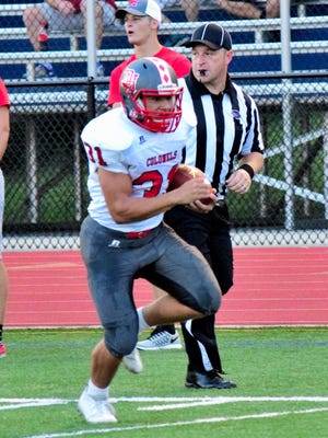 Jose Torres (31) of Dixie Heights breaks free for a Colonels' touchdown, August 26, 2016.