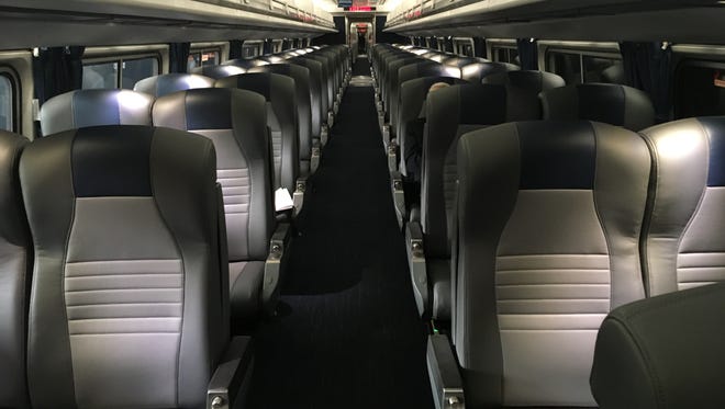 Amtrak is replacing the carpeting, seat cushions and lighting in 450 cars on the Northeast Corridor, as shown here in business class designated by the blue panel at the top of the seats on Nov. 13, 2017, at Washington's Union Station.