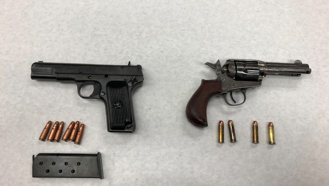 Firearms located  Thursday in Oxnard after they were allegedly tossed from a vehicle after a brief pursuit.