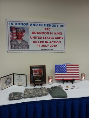 A memorial honors PFC Brandon King.