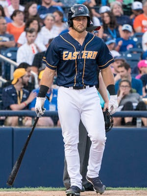 Jul 11, 2018; Trenton, NJ, USA; Binghamton Rumble Ponies outfielder Tim Tebow (15) picks up a bat at the end of the second inning during the Eastern League All Star Game at ARM & HAMMER Park.