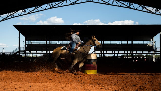 Budha Jumper competes in 13-17 year old barrel racing during the Junior Cypress Memorial Rodeo at the Junior Cypress Rodeo Arena in Clewiston, Fla. on Saturday, March 17, 2018.