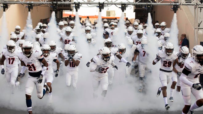 The UTEP Miners run onto the field to face the Rice Owls on Saturday, Sept. 9, 2017 at Sun Bowl.