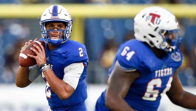 Tennessee State quarterback O'Shay Ackerman-Carter (2) looks for an opening against Arkansas-Pine Bluff during the first half Saturday.