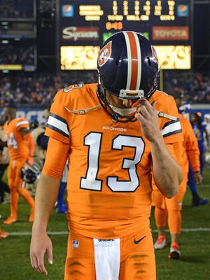 Oct 13, 2016; San Diego, CA, USA; Denver Broncos quarterback Trevor Siemian (13) reacts as he walks off the field after a 21-13 loss to San Diego Chargers at Qualcomm Stadium.