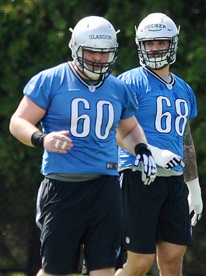 Graham Glasgow (60) plans to compete with Travis Swanson for the center spot.