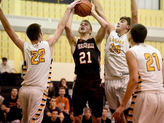 Nick Guillemain #21 under tough pressure by the Cresskill