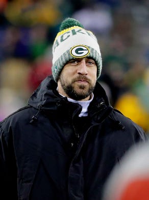 Green Bay Packers quarterback Aaron Rodgers watches from the sideline before the game against Minnesota.