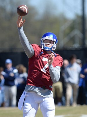 Redshirt freshman QB Drew Barker throws during the Kentucky football scrimmage on Saturday, April 11, 2015.