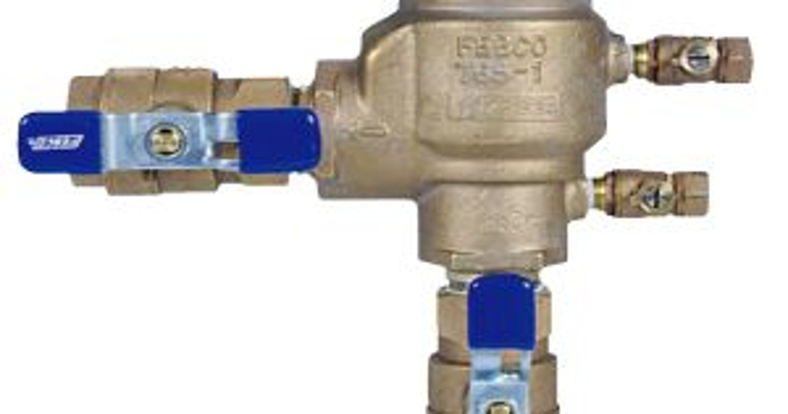 Man blowing out sprinkler system with air compressor