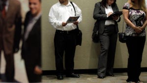 Job seekers line up for interviews during a job fair sponsored by the California Job Journal.
