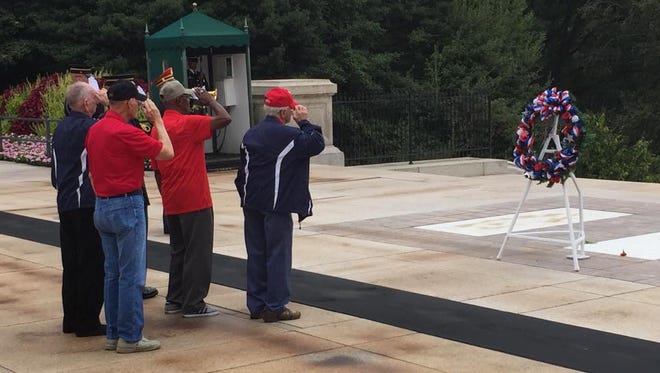 Bill Lattimore, David Riddle, Albert Kelly and Lee Broussard present a wreath at the Tomb of the Unknowns.