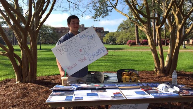 Pooler tables outside of Strozier Library campaigning for Bernie Sanders.