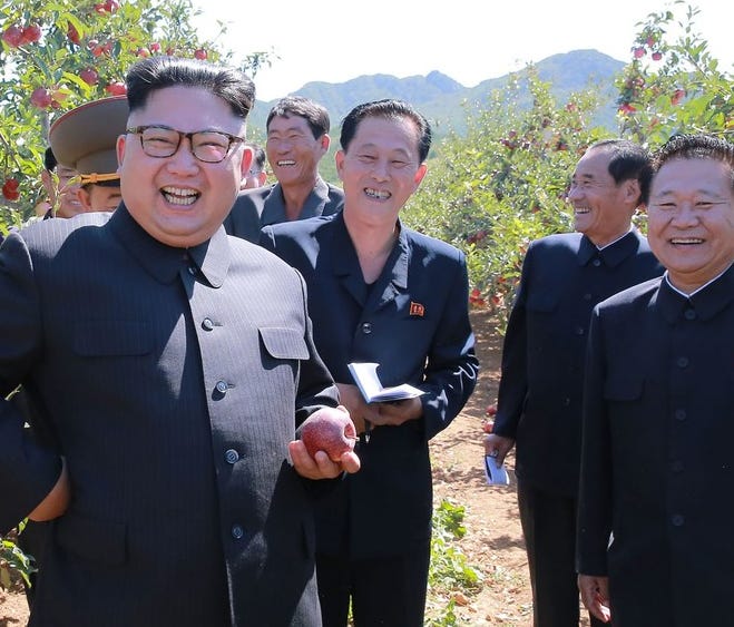 This undated picture released from North Korea's official Korean Central News Agency on Sept. 21 shows North Korean leader Kim Jong Un visiting a fruit farm.