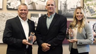 Evangel University graduates Dr. Kirt Hartzler and Lindsay Yates were presented their “Distinguished Aslumnus Awards” by Dr. Keith Hardy, chair of the Department of Kinesiology.