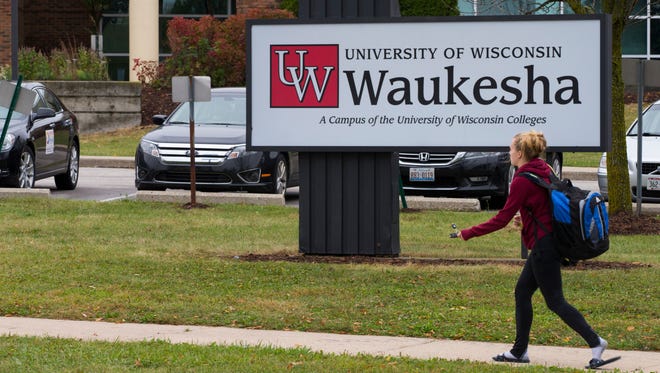 A student arrives at UW-Waukesha in 2017. The UW Board of Regents has announced the campus' new name, University of Wisconsin-Milwaukee at Waukesha, as part of the mergers of two-year UW institutions into the four-year campuses.