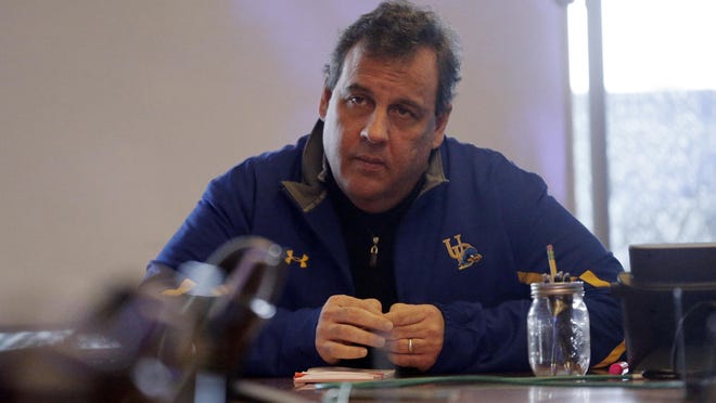 New Jersey Gov. Chris Christie wears a University of Delaware jacket as he listens to a briefing Jan. 23 in Woodbridge, N.J., on the recent snowstorm.