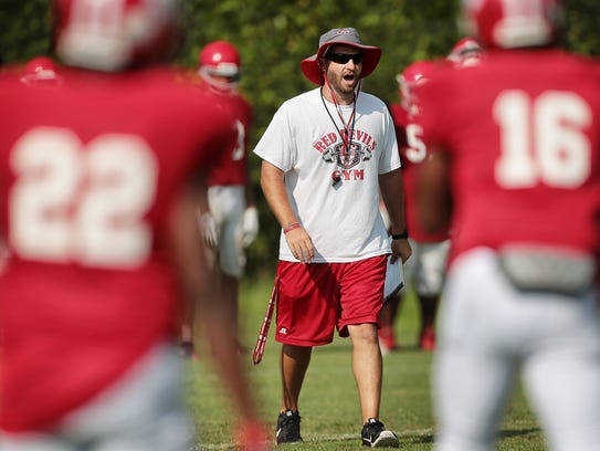 Germantown High School coach Chris Smith directs his