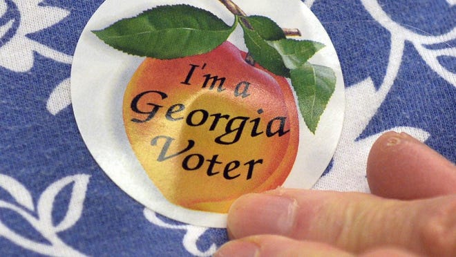 This year the League of Women Voters of Coastal Georgia and 9to5 Georgia have arranged for local businesses to give incentives for voting in the midterm elections. Just show your "I'm a Georgia Voter" sticker for your incentive at those businesses. Shown: Nancy Tuttle  wears her sticker after voting in the Thunderbolt election in 2017.