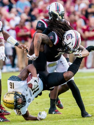 Oct 28, 2017; Vanderbilt Commodores wide receiver Kalija Lipscomb (16) is upended by South Carolina Gamecocks in the first half at Williams-Brice Stadium.