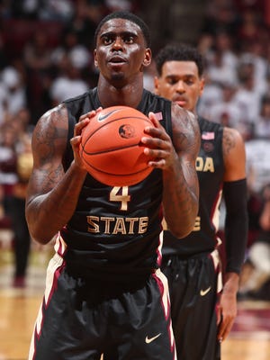 Florida State guard Dwayne Bacon shoots a free throw during a win over Florida.