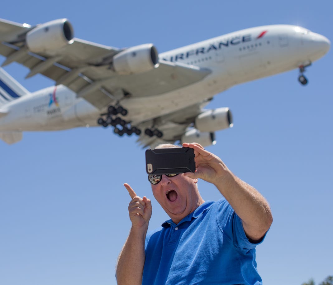 A gentleman has fun taking a selfie with an arriving Air France Airbus A380 near Los Angeles International Airport on May 13, 2017.