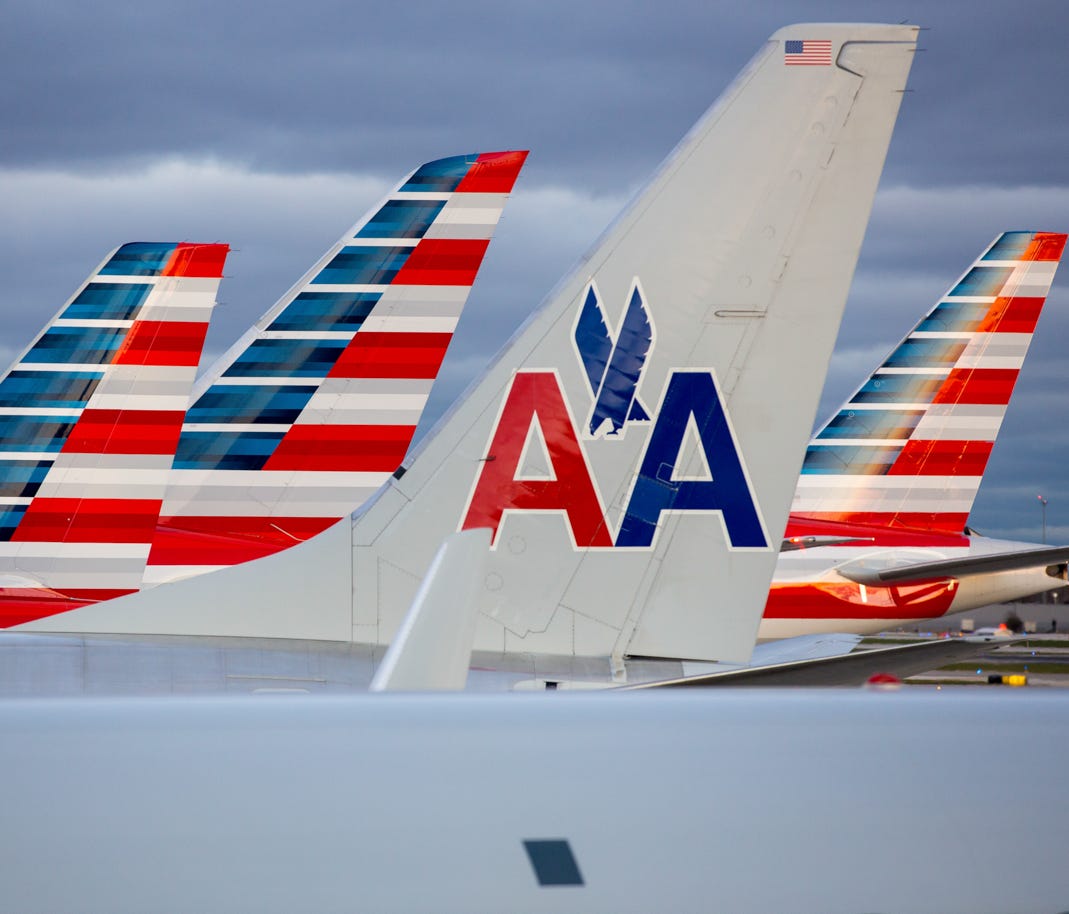 American Airlines tails line up at Terminal 3 at Chicago O'Hare International Airport on Nov. 11, 2016.
