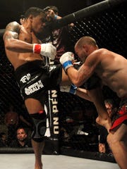 Tallahassee's Rafael Valdez knees Jimmy Alexander in
