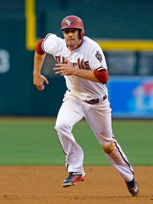 Arizona Diamondbacks center fielder A.J. Pollock runs to third base during the first inning  against the Atlanta Braves Monday, June 1, 2015, in Phoenix.