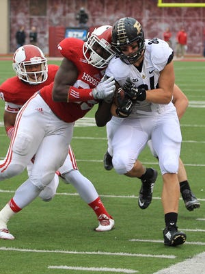 Indiana defensive tackle Bobby Richardson, shown here driving Purdue tight end Justin Sinz out of bounds this past season, is one of the most high-profile undrafted free agents signed by the New Orleans Saints.