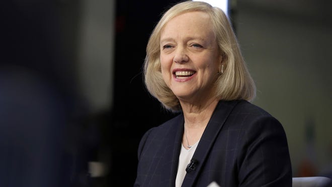 FILE - In this Nov. 2, 2015 file photo, Hewlett Packard Enterprise President and CEO Meg Whitman is interviewed on the floor of the New York Stock Exchange. Top Republican donor and fundraiser Whitman is endorsing Democrat Hillary Clinton for president, saying she cannot support a candidate who has "exploited anger, grievance, xenophobia and racial division." The Hewlett-Packard executive says in a statement Tuesday night, Aug. 2, 2016, that Republican nominee Donald Trump's "demagoguery has undermined the fabric of our national character." (AP Photo/Richard Drew, File)